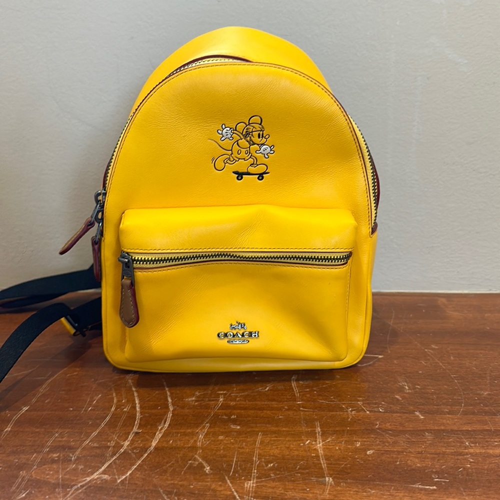 Coach Mickey skateboarding yellow backpack